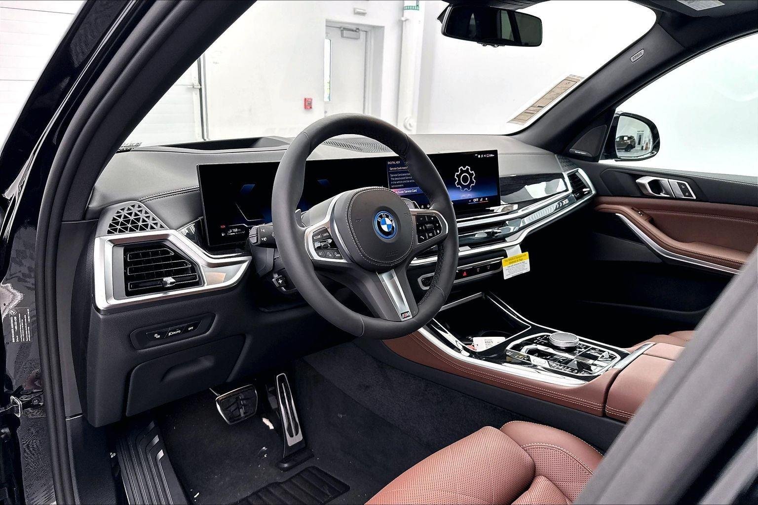 New 2026 Black Sapphire Metallic BMW xDrive50e image 22
