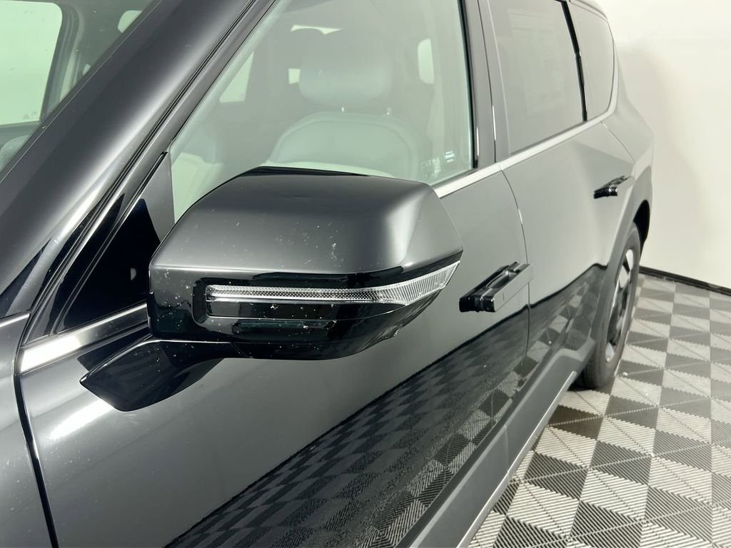 New 2026 Ebony Black Kia Wind AWD image 11