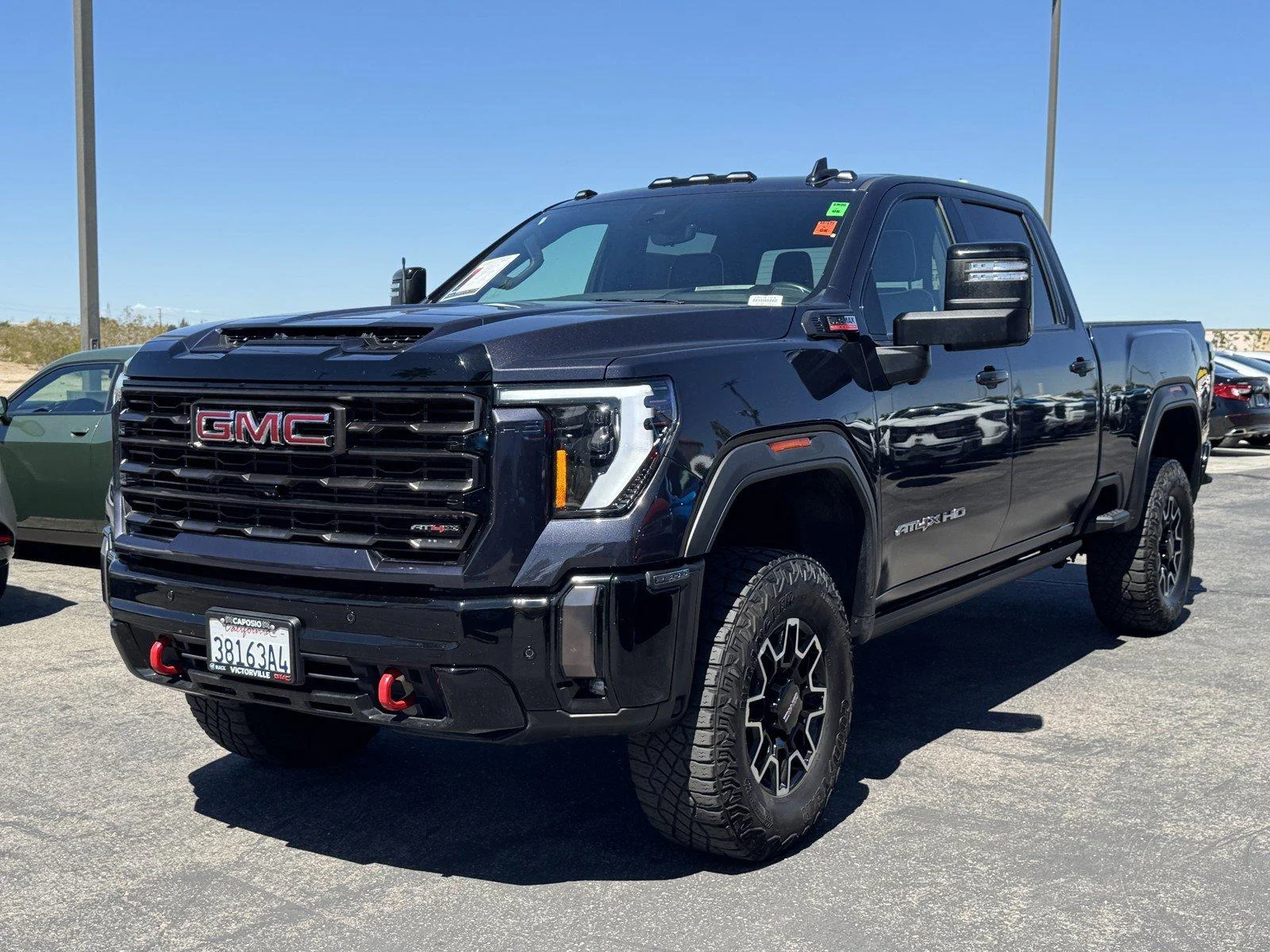 Used 2024 Titanium Rush Metallic GMC AT4X image 3
