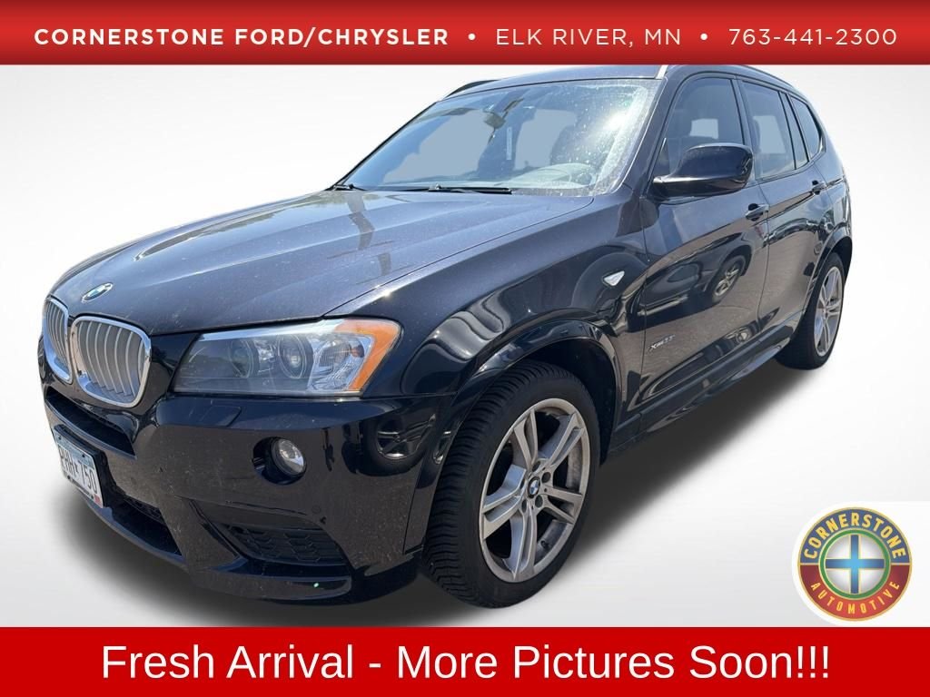 Used 2014 Black BMW xDrive35i image 1
