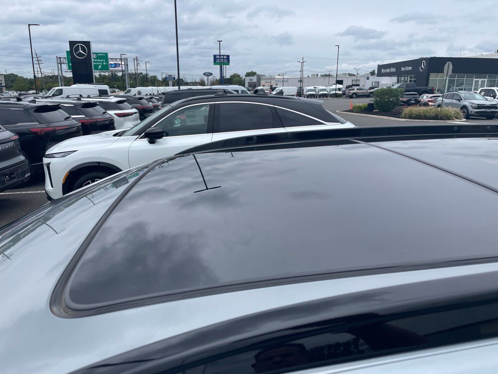 Used 2024 Argent Silver Metallic Cadillac Sport image 4