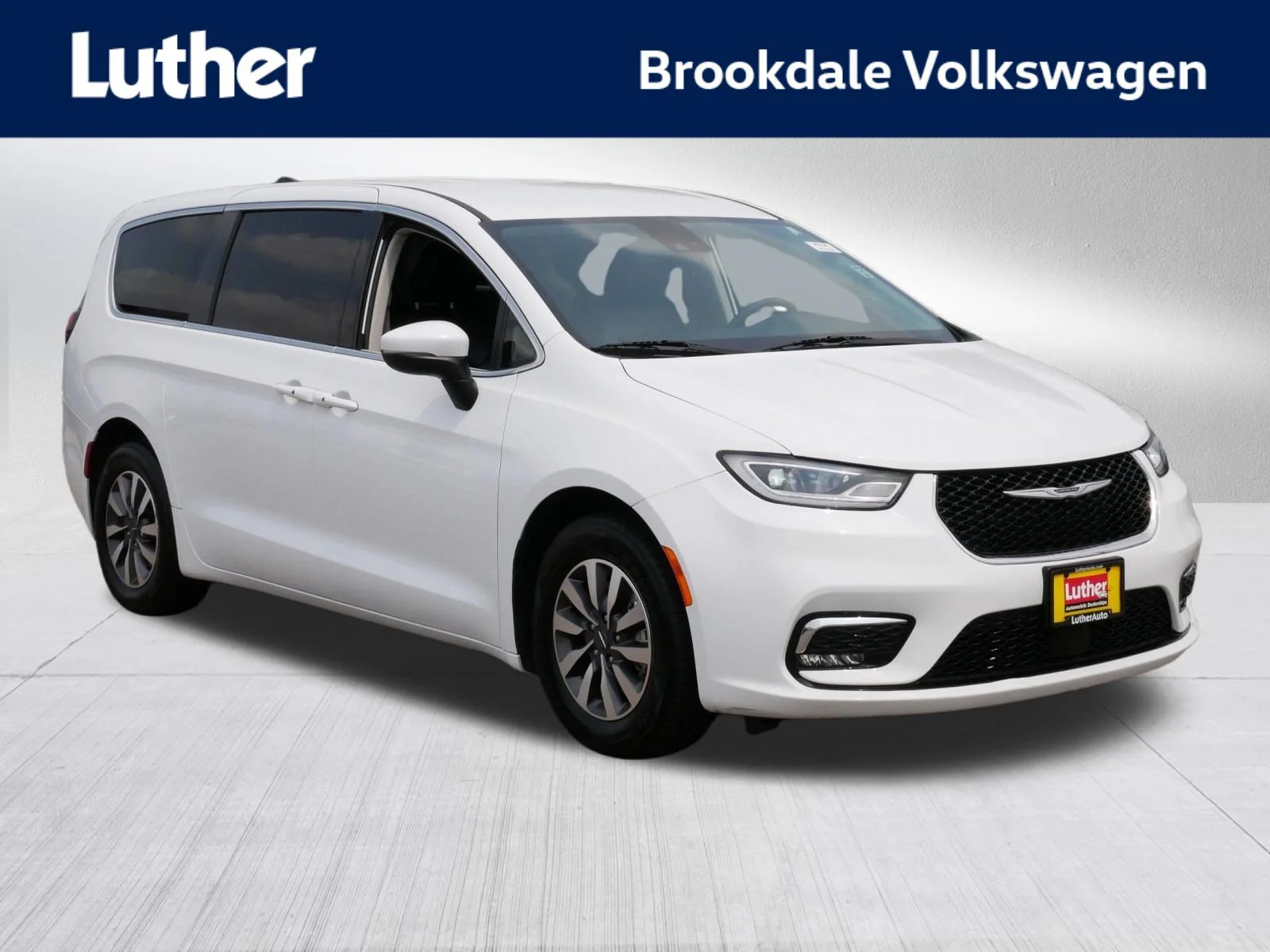 Used 2023 Bright White Clearcoat Chrysler Hybrid Touring L image 1