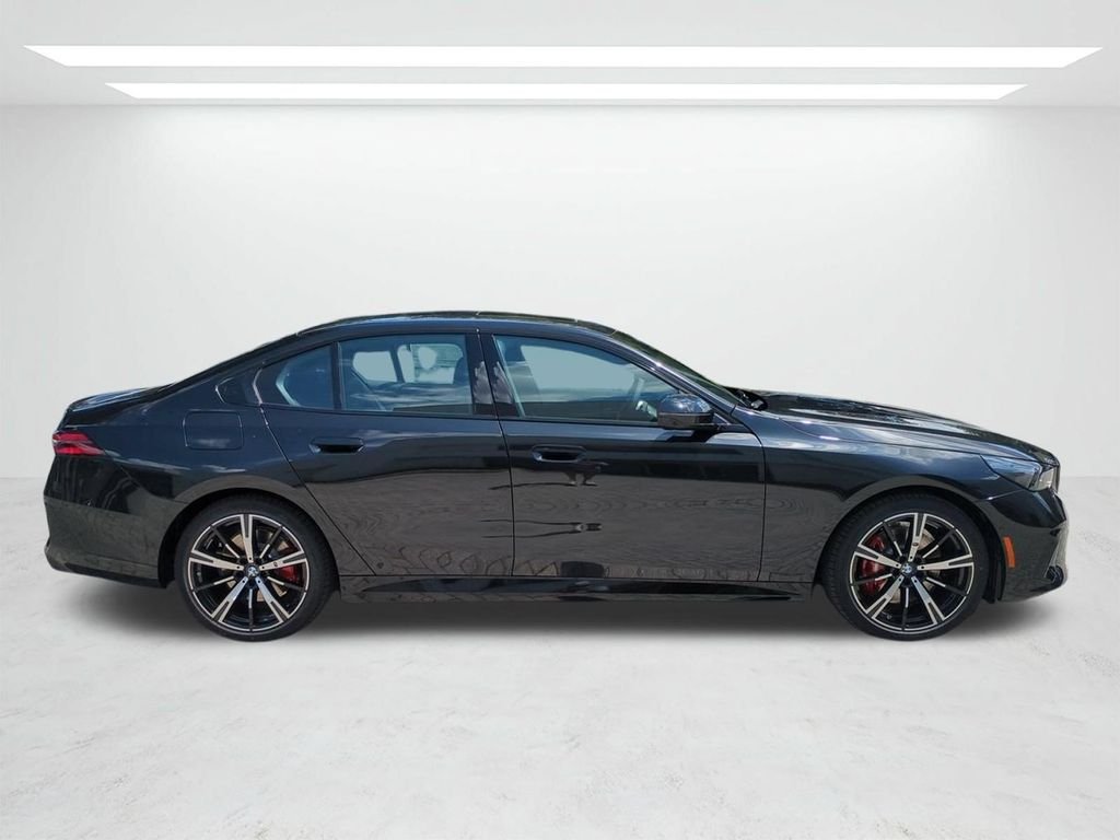 New 2027 Black Sapphire Metallic BMW 530i image 3