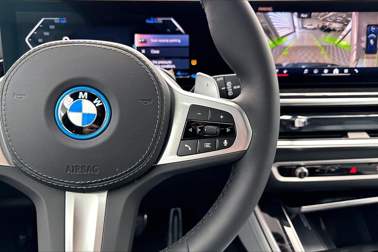 New 2026 Tanzanite Blue II Metallic BMW xDrive50e image 17