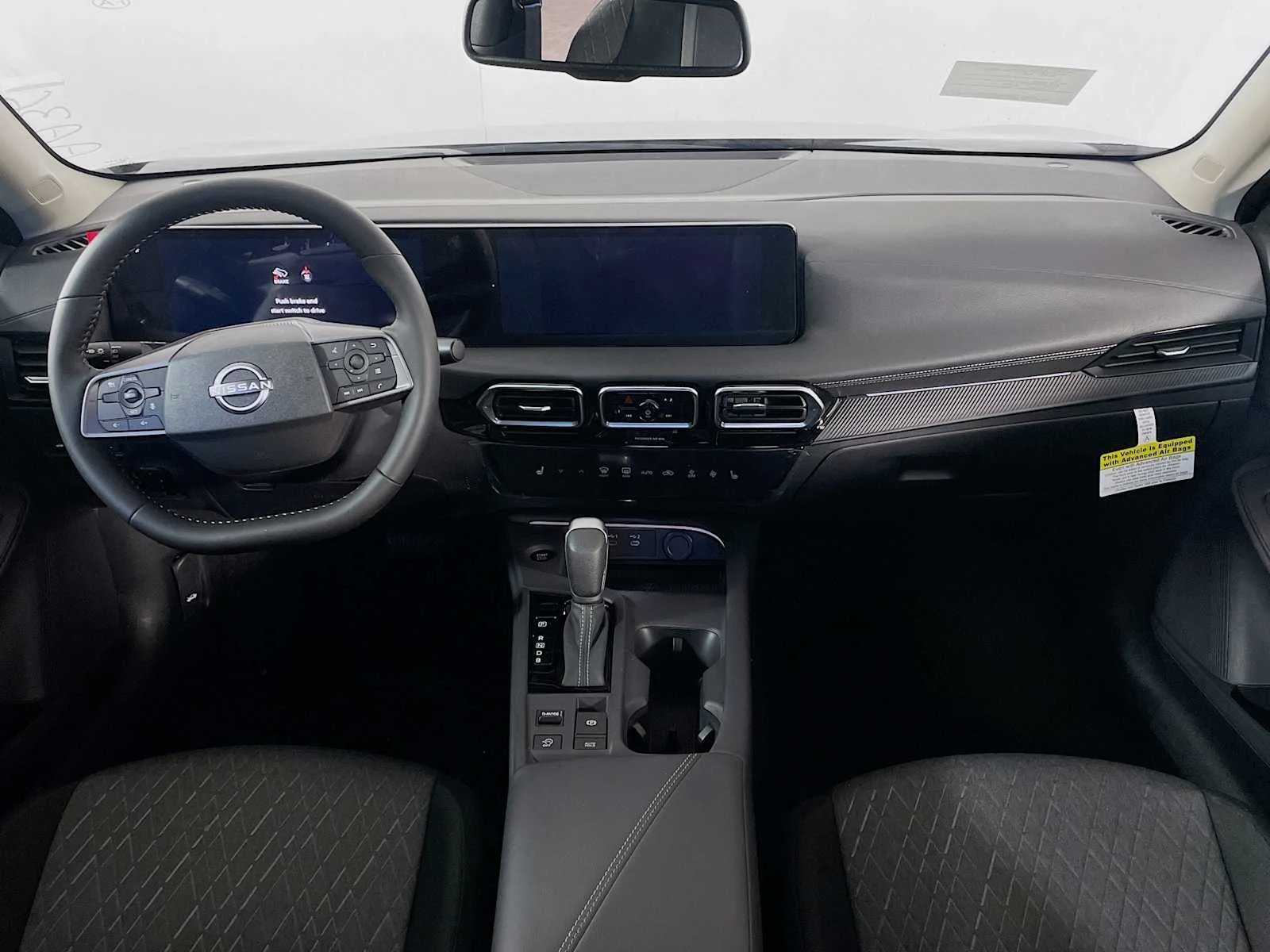 New 2026 Gun Metallic Nissan SV image 3