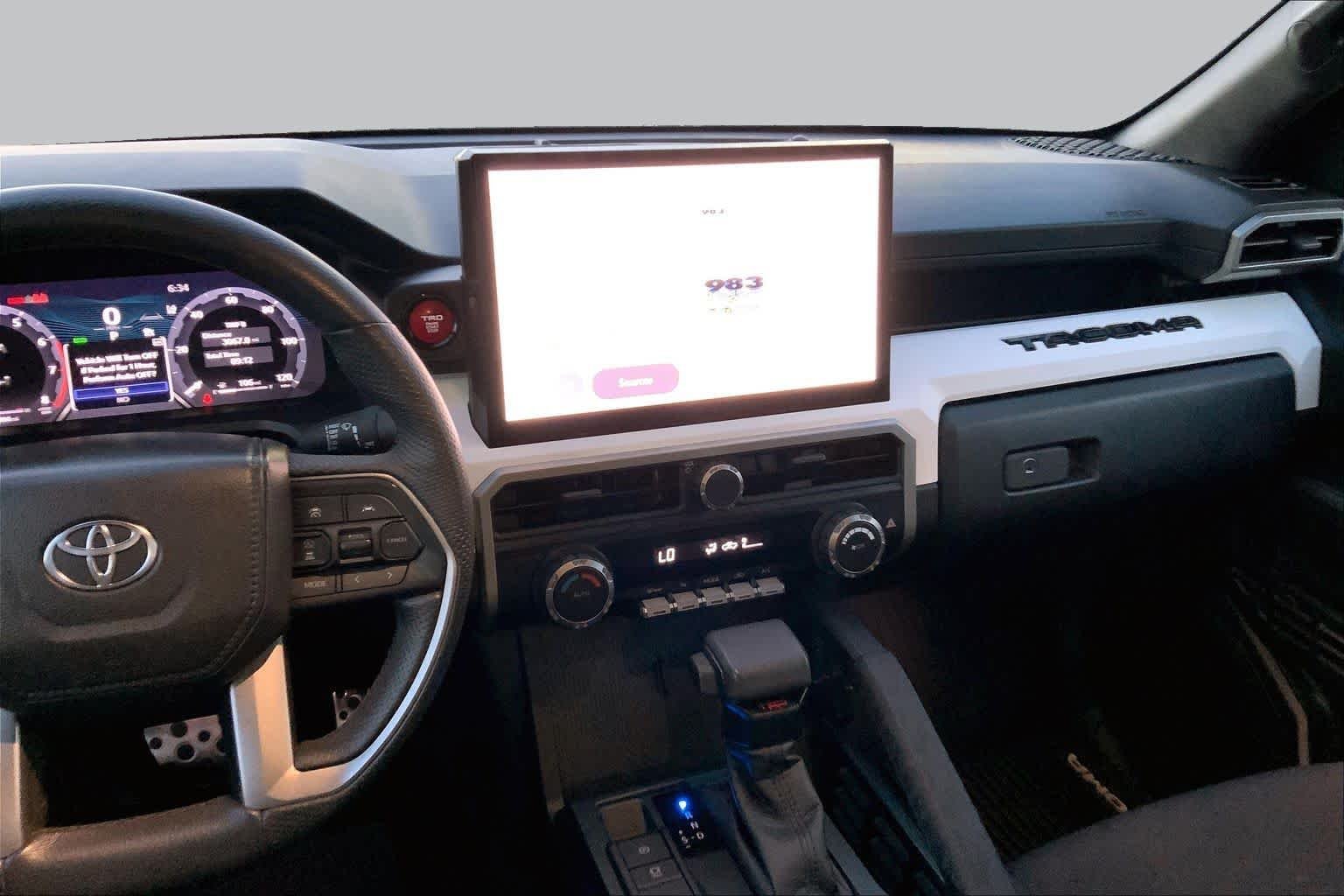 Used 2024 Bronze Oxide Toyota TRD Sport image 7