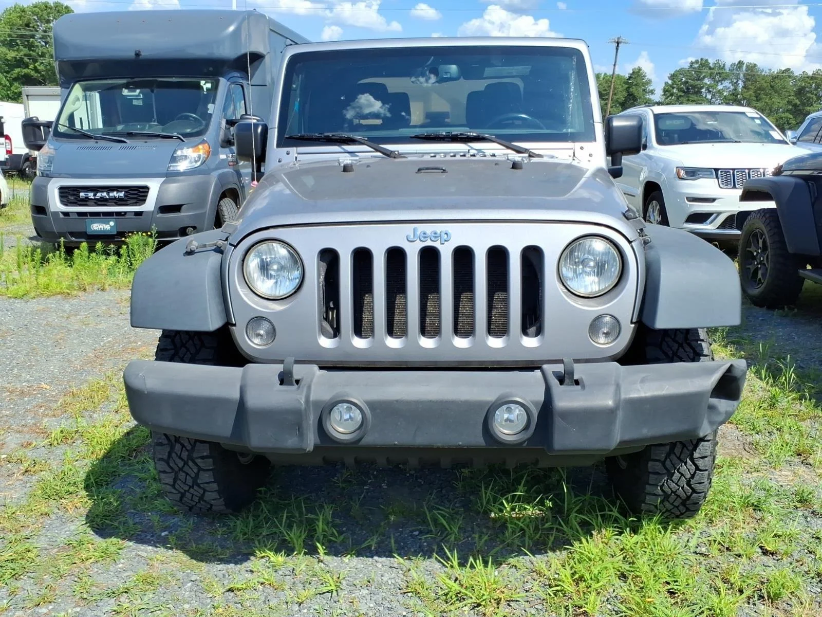 Used 2015 Billet Silver Metallic Clearcoat Jeep Sport image 13