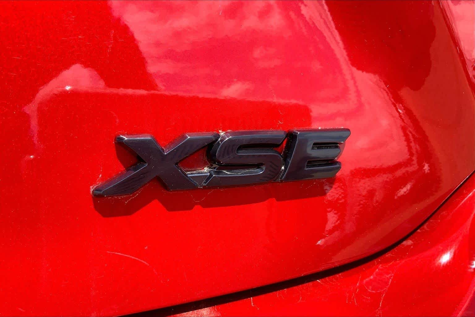 Used 2025 Supersonic Red/Midnight Black Metallic Toyota XSE image 10