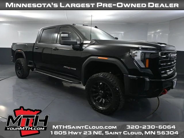 Used 2024 Black GMC AT4 image 1