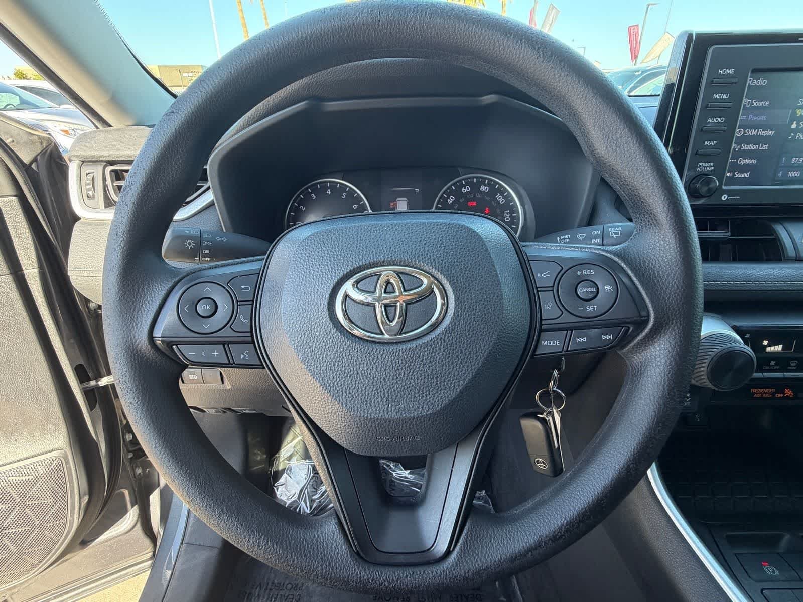Used 2022 Magnetic Gray Metallic Toyota LE image 19