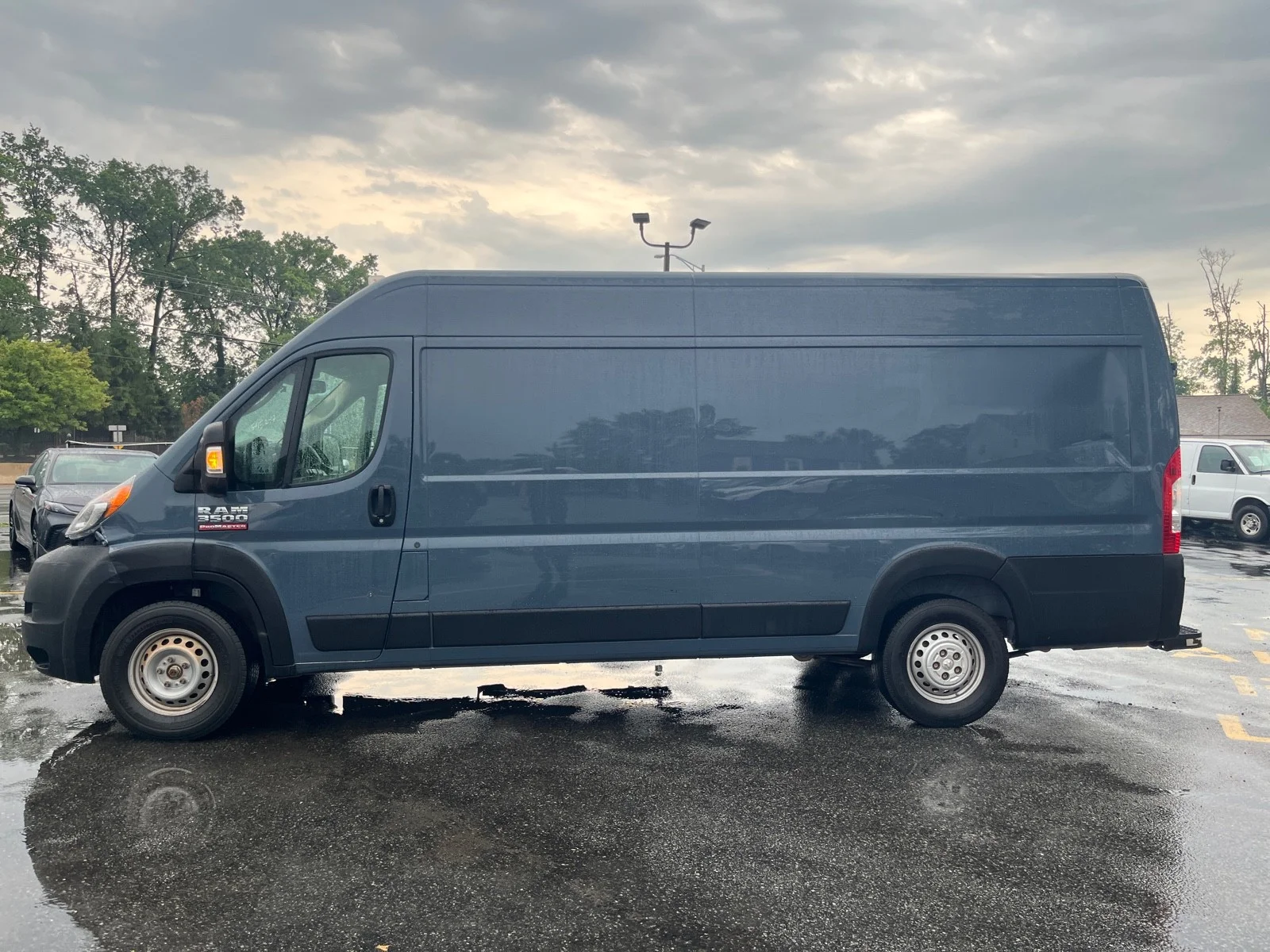 Used 2021 Patriot Blue Pearlcoat Ram High Roof 3500 159