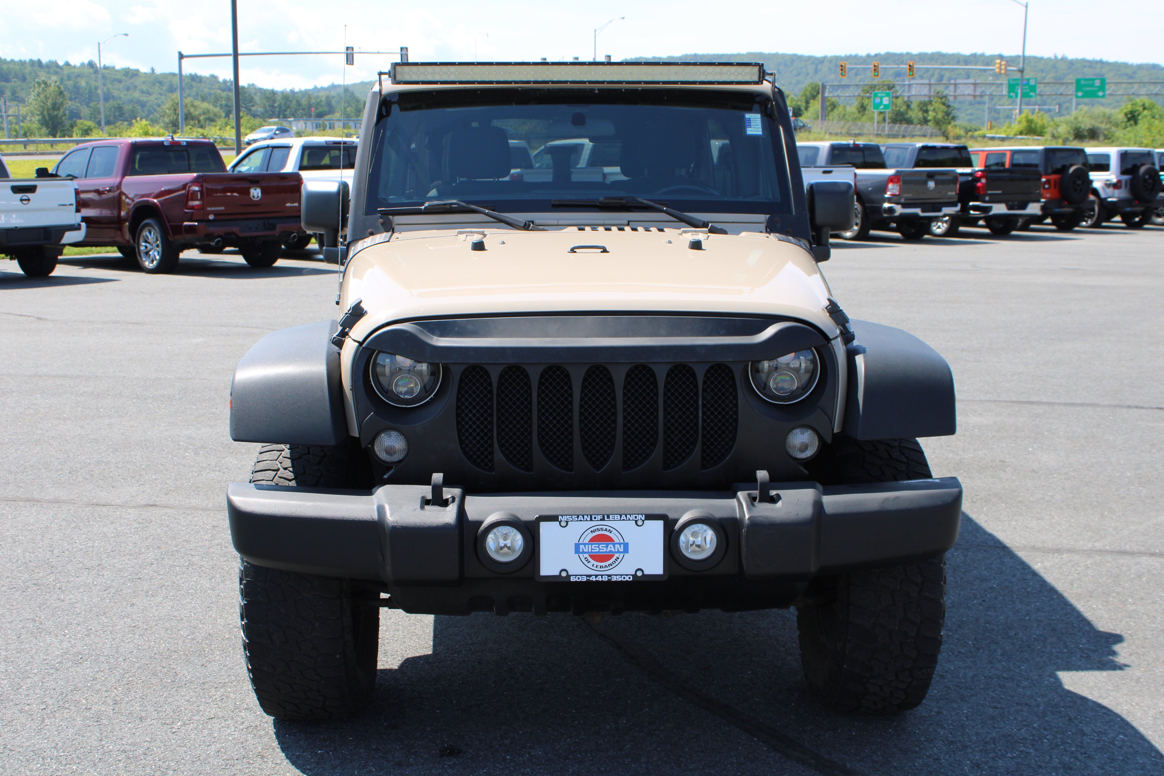 Used 2016 Mojave Sand Clearcoat Jeep Sport image 2