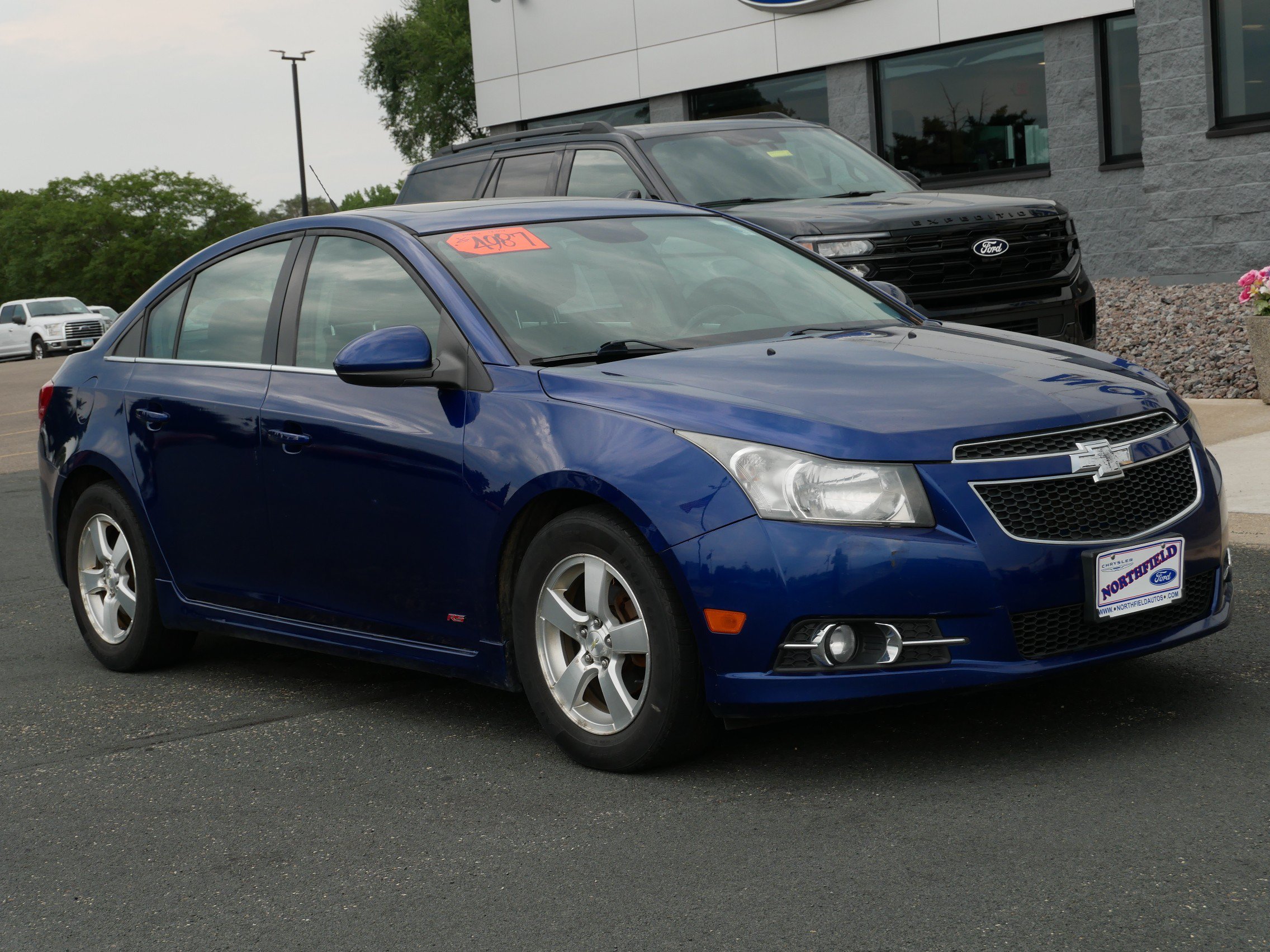 Used 2013 Chevrolet Cruze 1LT with VIN 1G1PC5SB1D7147113 for sale in Northfield, Minnesota
