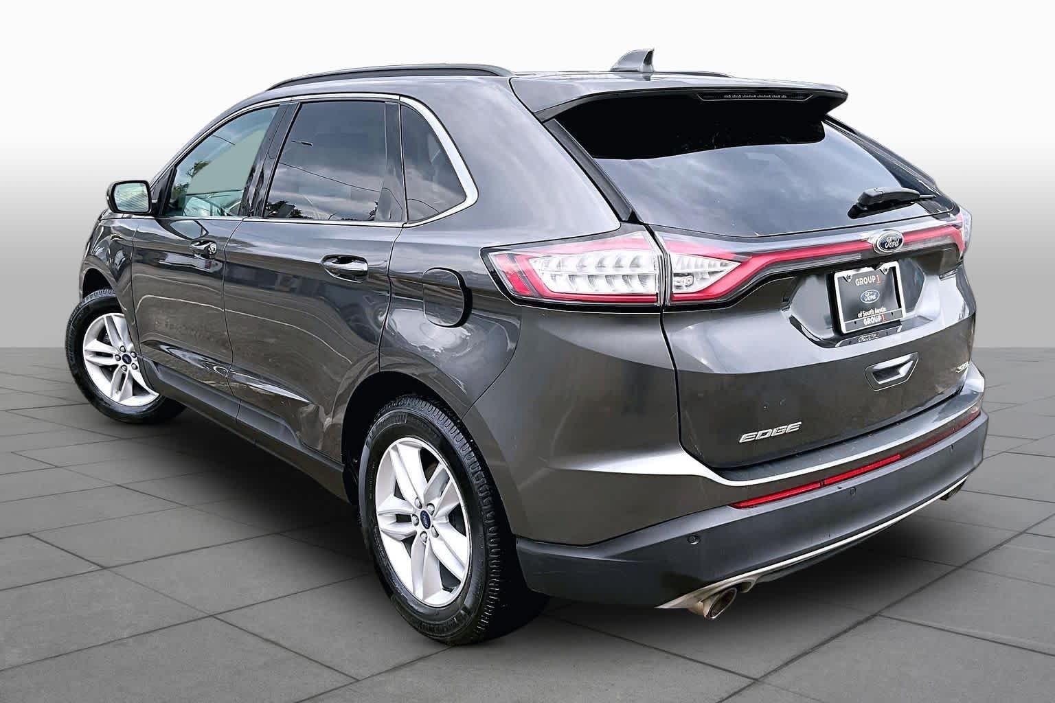 Used 2015 Magnetic Metallic Ford SEL image 14