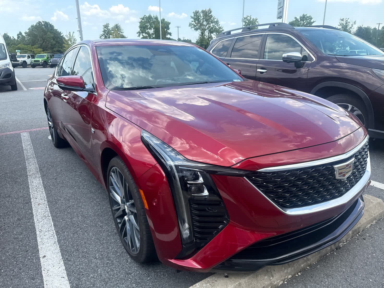 Used 2025 Radiant Red Tintcoat Cadillac Premium Luxury image 2