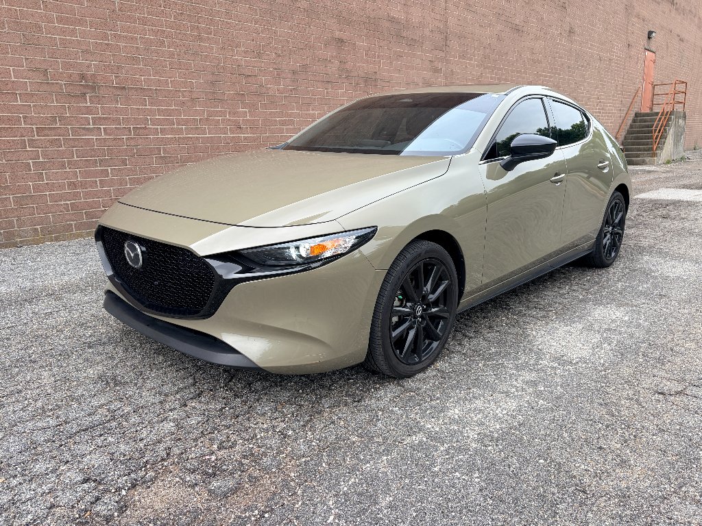 Zircon Sand Metallic 2024 Mazda MAZDA3 Hatchback All-Wheel Drive 6-Speed Automatic