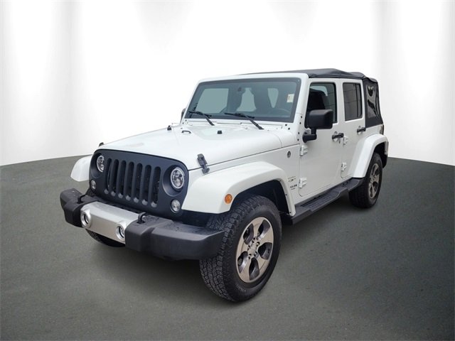 Certified 2017 Jeep Wrangler Unlimited Sahara with VIN 1C4BJWEGXHL732595 for sale in Lutz, FL
