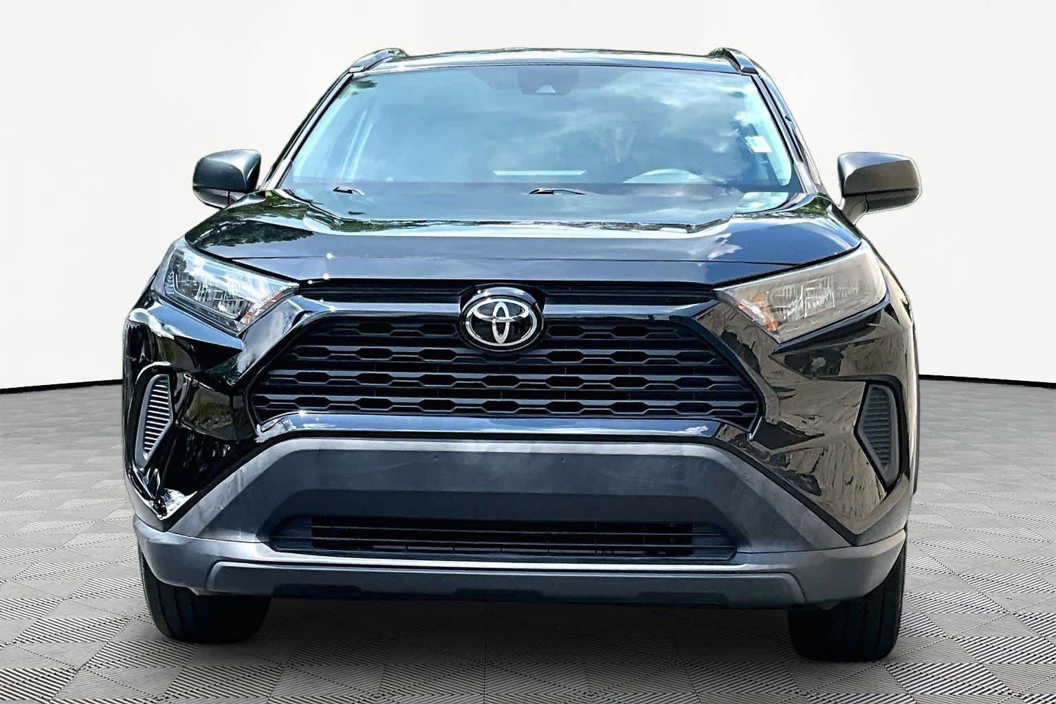 Used 2021 Midnight Black Metallic Toyota LE image 4