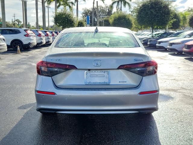 Certified Used 2025 Solar Silver Metallic Honda 4D HYBRID SPORT TOURING image 5