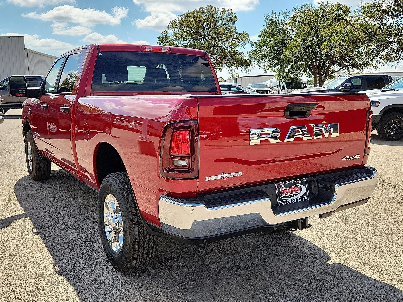 New 2026 Molten Red Pearl-Coat  Paint Ram LONE STAR CREW CAB 4X4 6