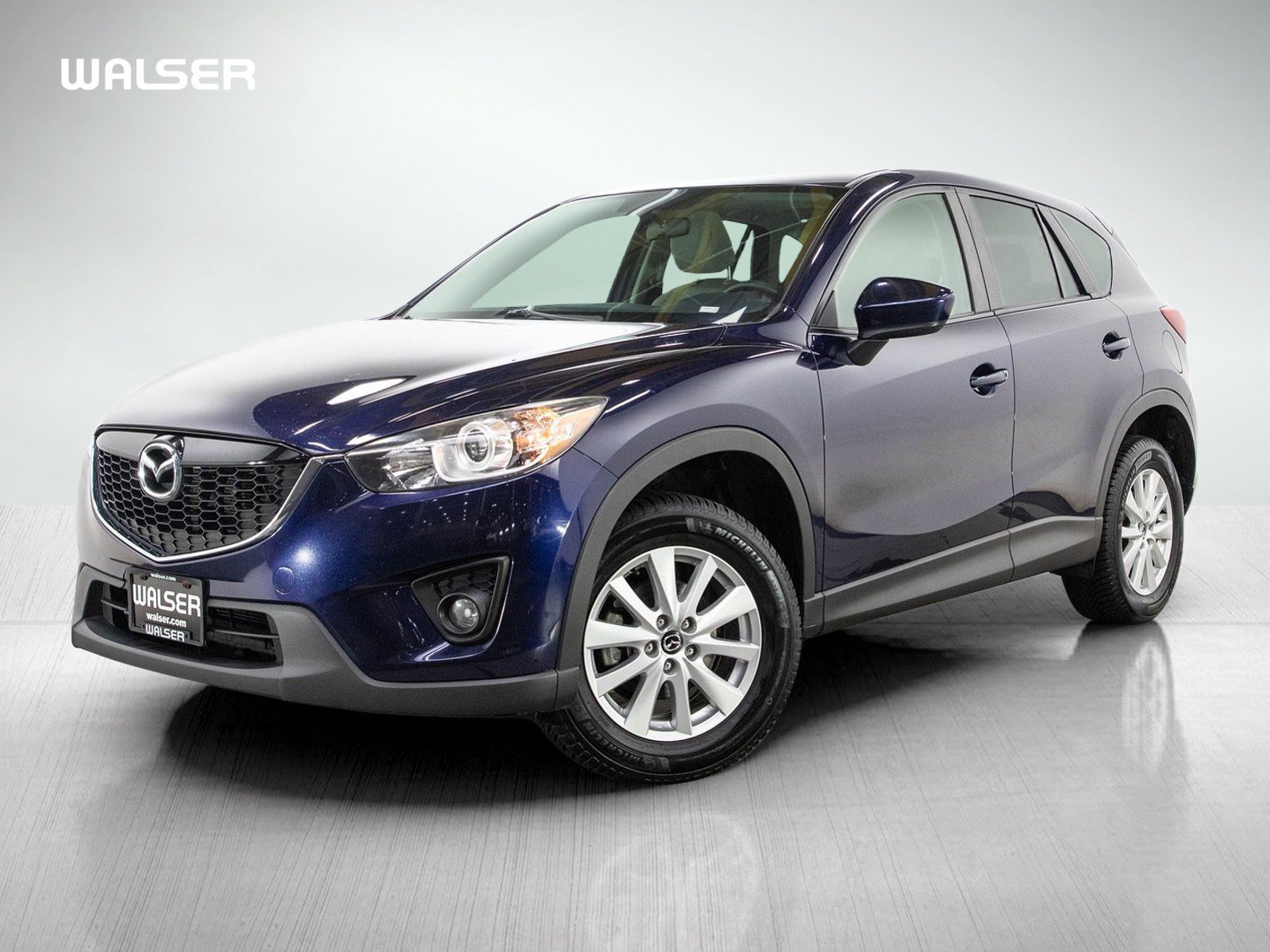 Used 2014 Stormy Blue Mica Mazda Touring image 1