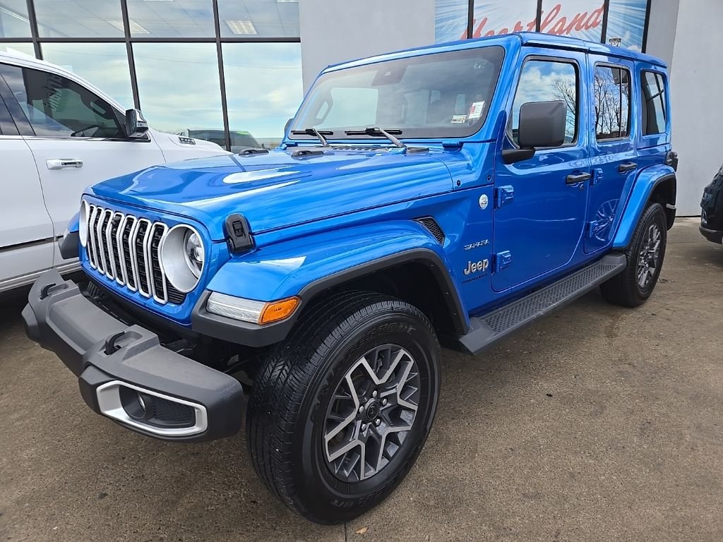 Used 2024 Jeep Wrangler 4-Door Sahara with VIN 1C4PJXEG2RW335717 for sale in Kansas City