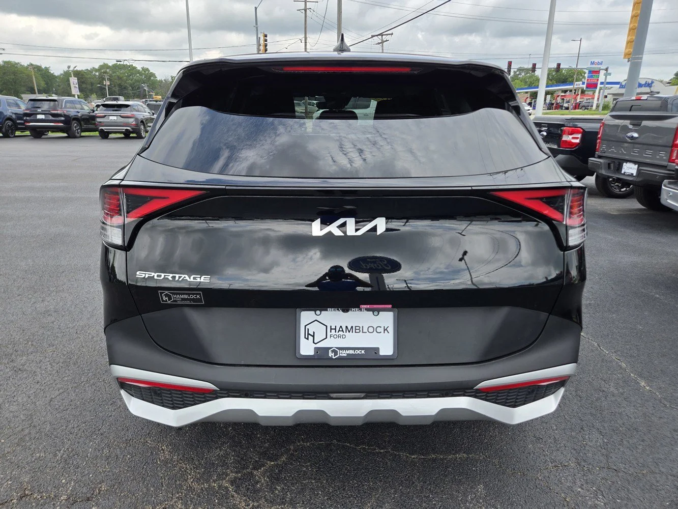 Used 2025 Ebony Black Kia LX image 6