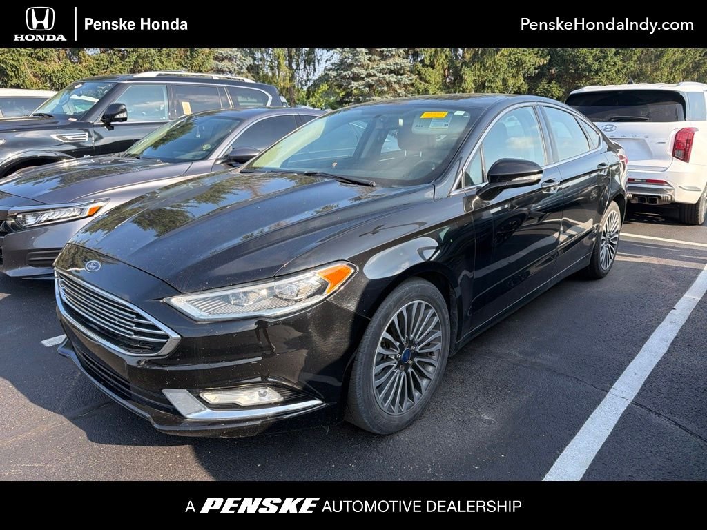 Used 2017 Shadow Black Ford SE image 1