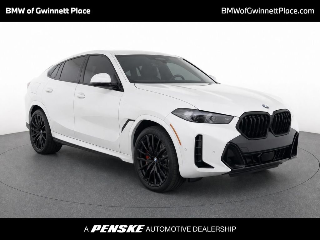 Certified Used 2026 White Metallic BMW xDrive40i image 1