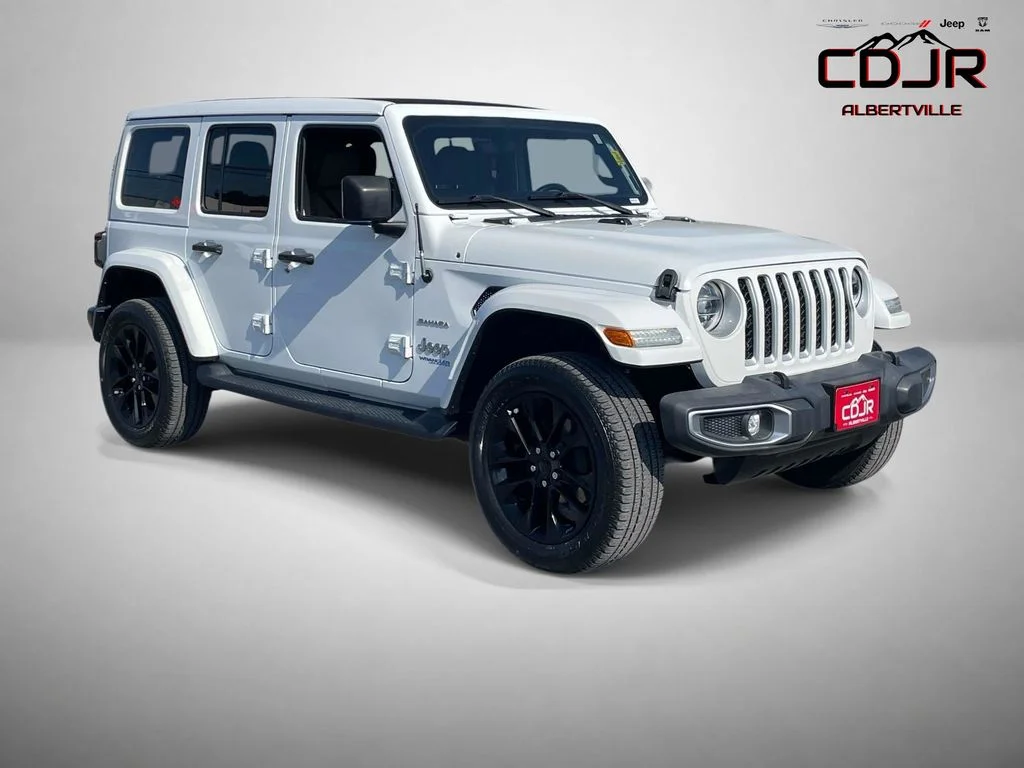 Used 2021 White Jeep Unlimited Sahara 4xe image 1