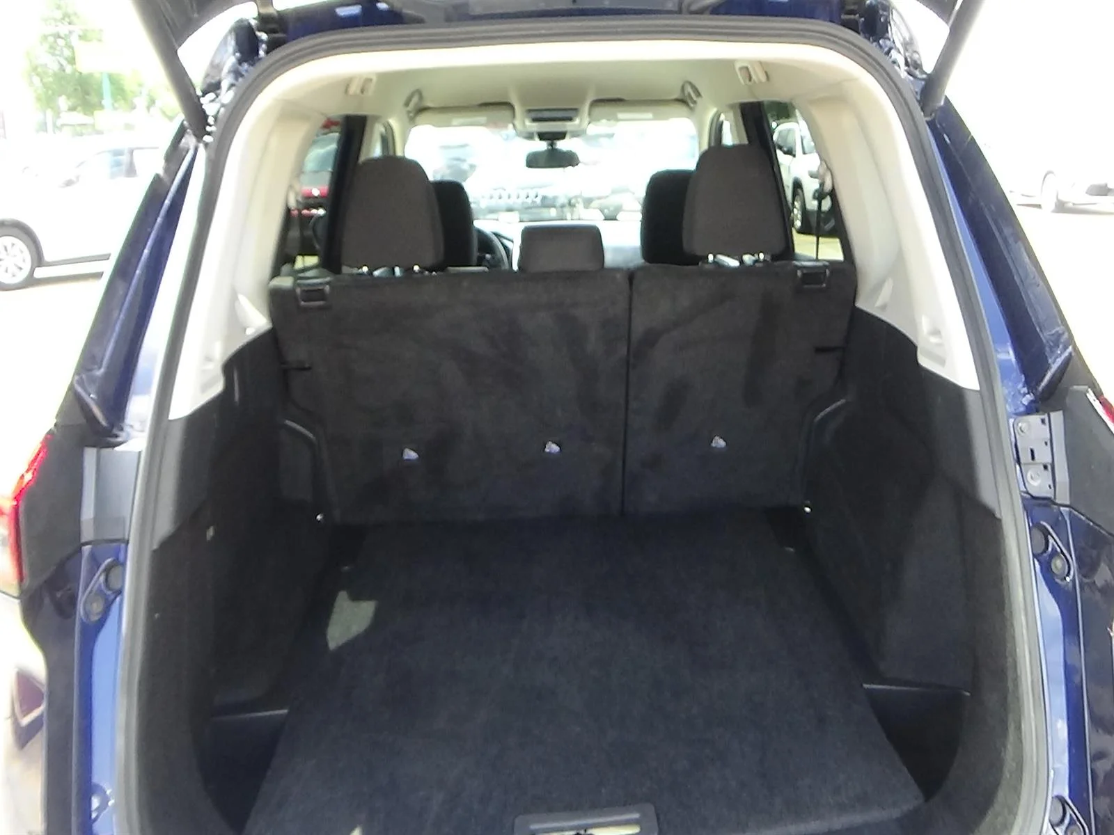 Used 2025 Deep Ocean Blue Pearl (rcj) Nissan SV image 9