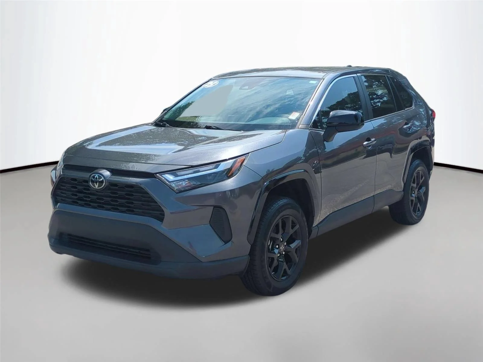 Used 2023 Magnetic Gray Metallic Toyota LE image 1