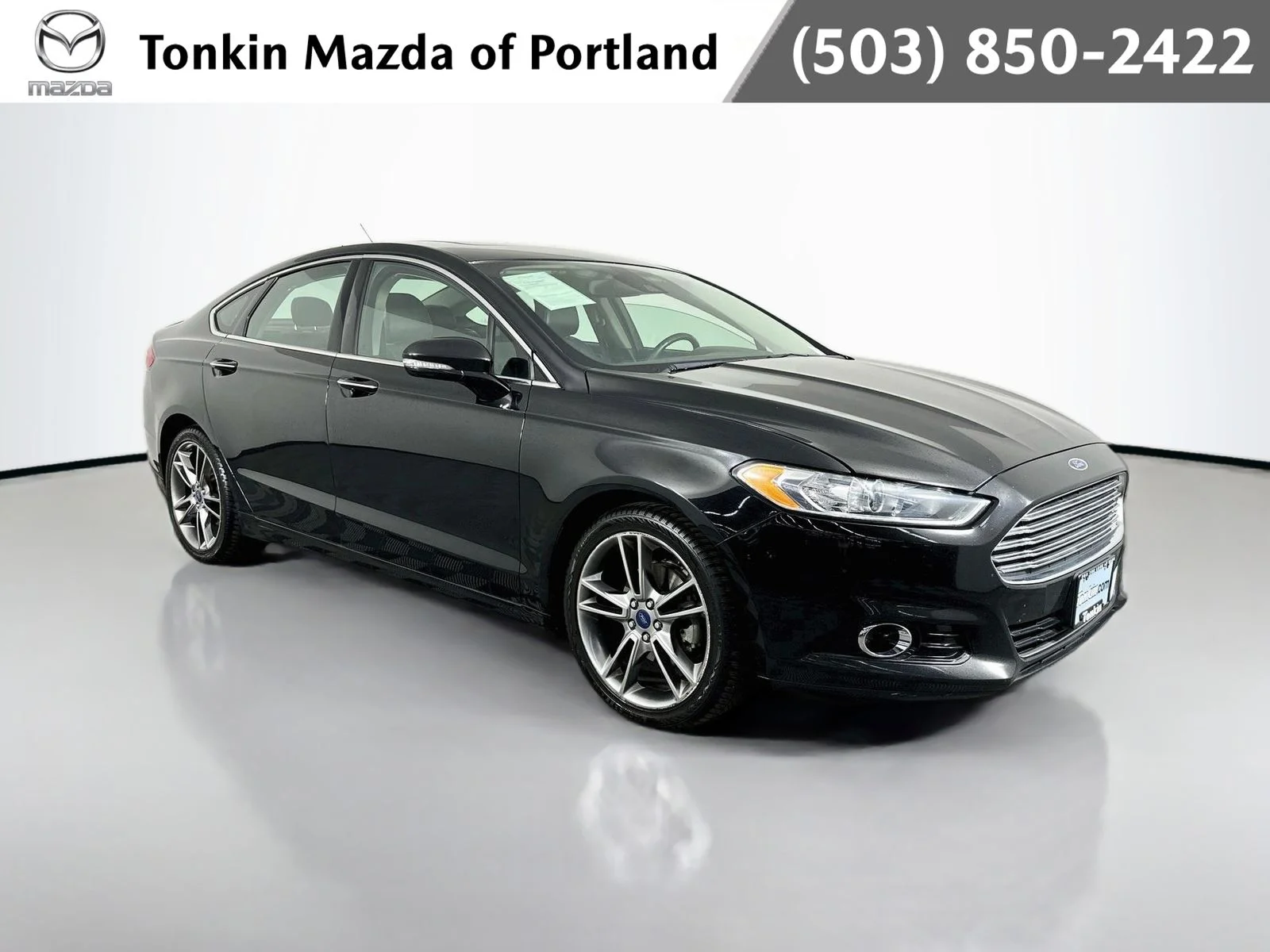 Used 2016 Shadow Black Ford Titanium image 1