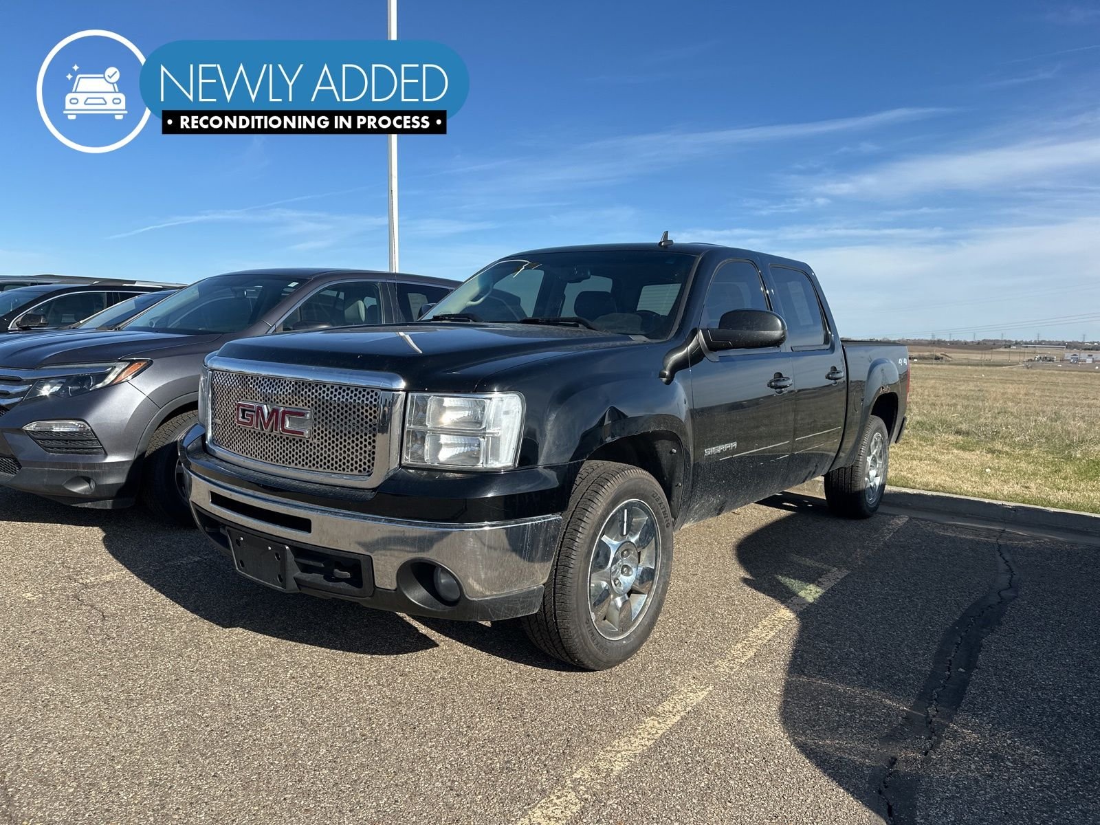 2010 GMC Sierra 4WD Crew Cab SLT SWB's photo