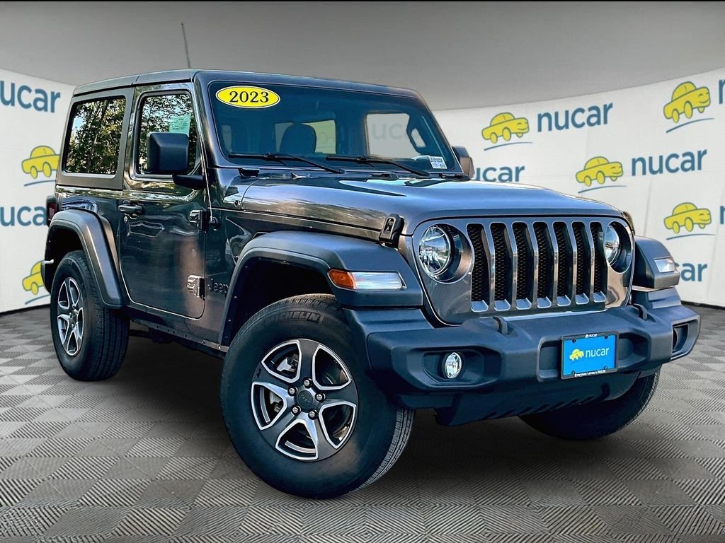 Used 2023 Granite Crystal Metallic Clearcoat Jeep Sport S image 1