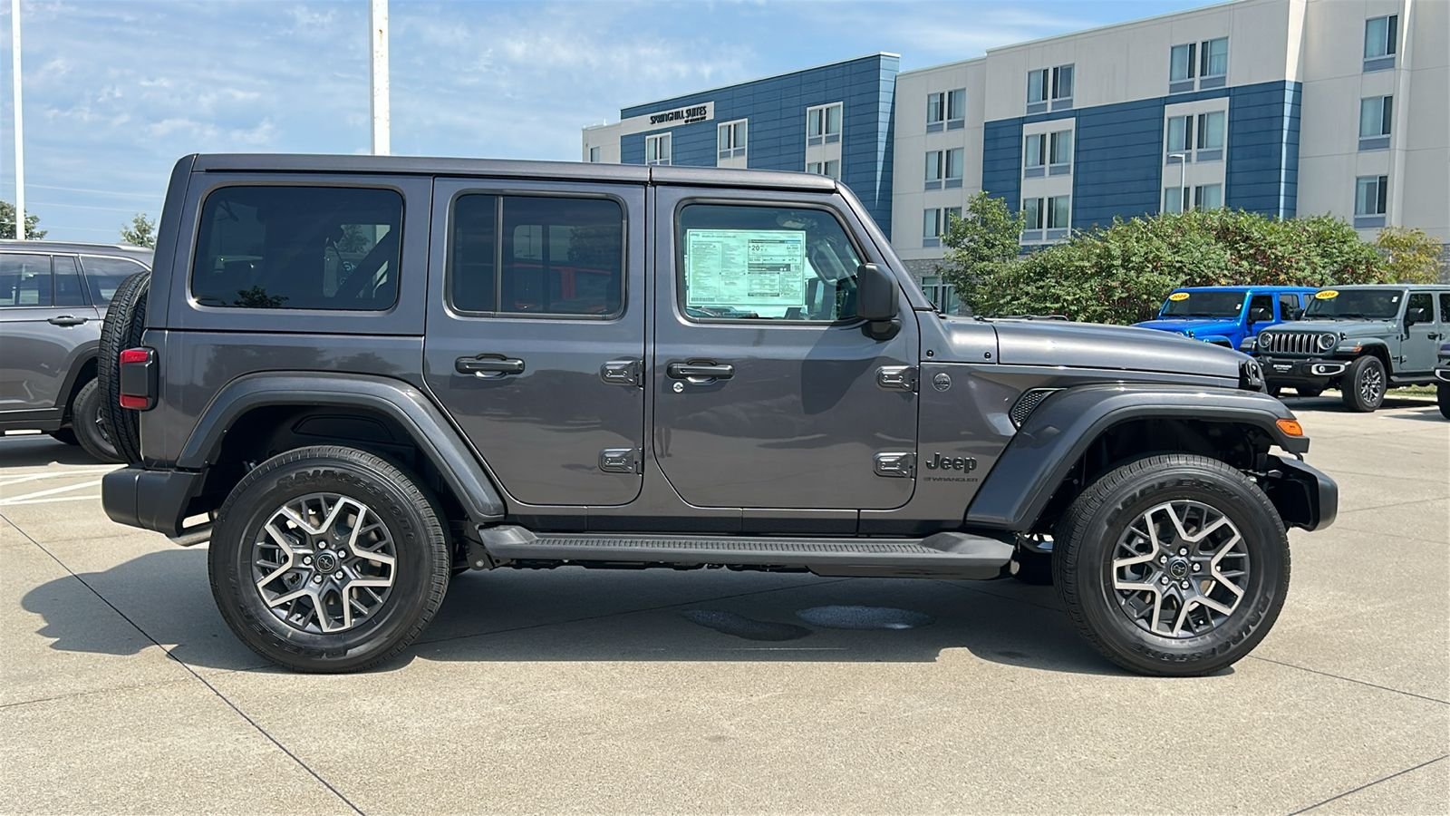 New 2026 Granite Crystal Metallic Clear-Coat Exterior Paint Jeep Sahara image 3
