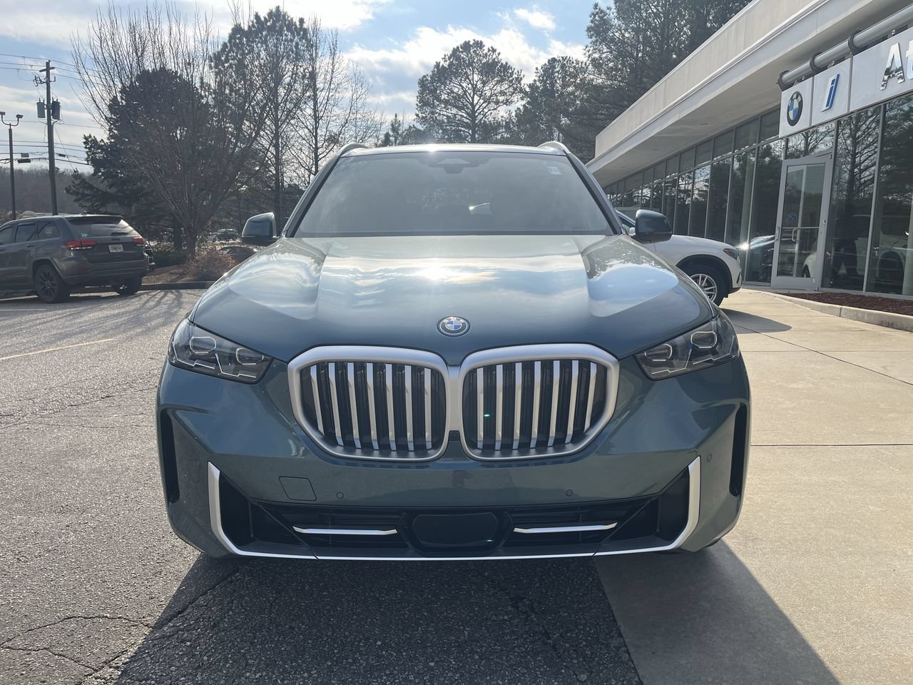 Used 2026 Blue Ridge Mountain Metallic BMW xDrive50e image 3