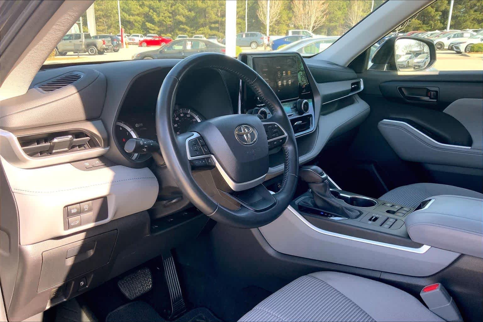 Used 2023 Midnight Black Metallic Toyota LE image 29