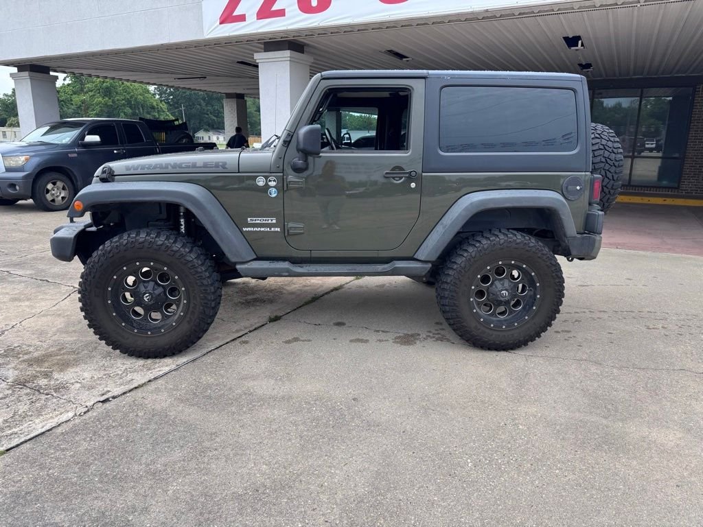 Used 2015 Jeep Wrangler Sport with VIN 1C4AJWAG2FL752533 for sale in Plaquemine, LA