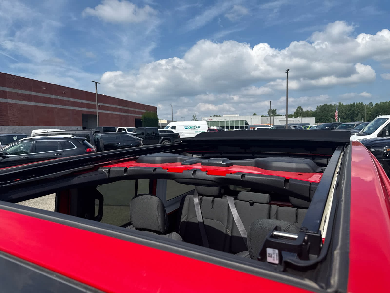 Used 2025 Firecracker Red Clearcoat Jeep Sahara image 10