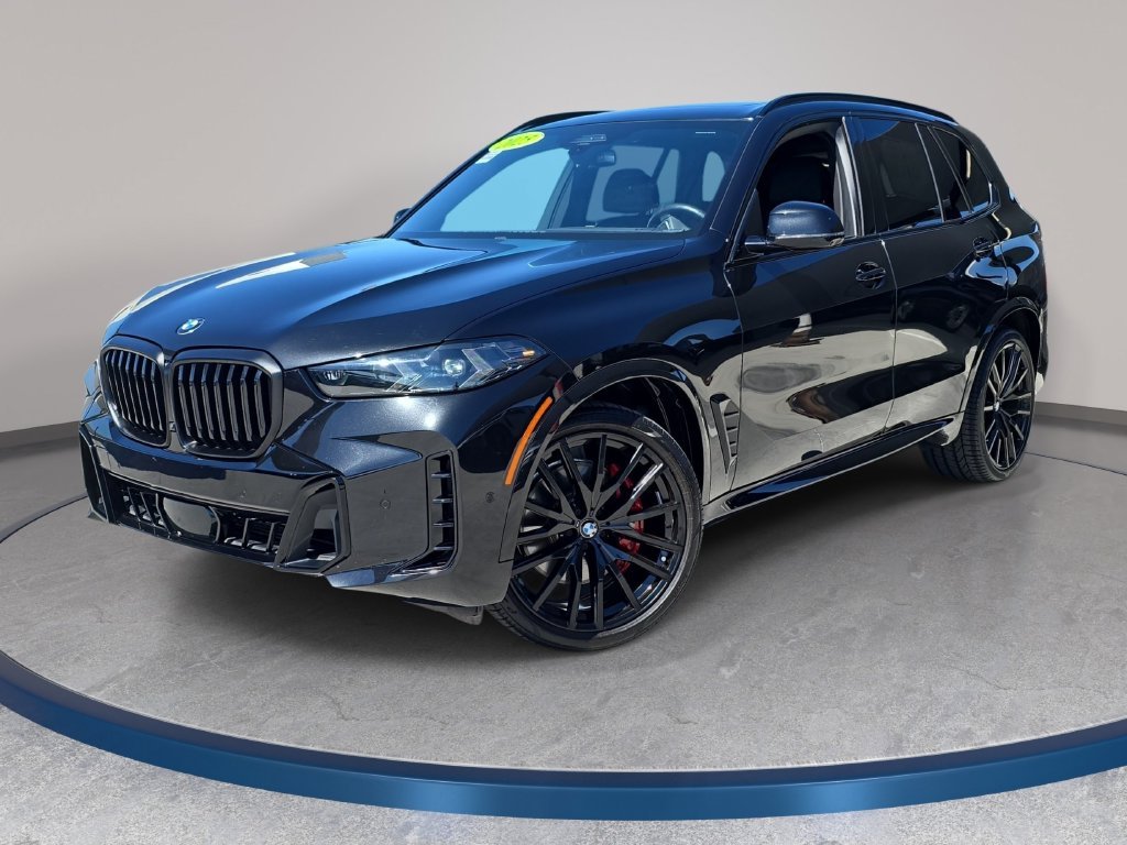 Used 2025 Black BMW sDrive40i image 1