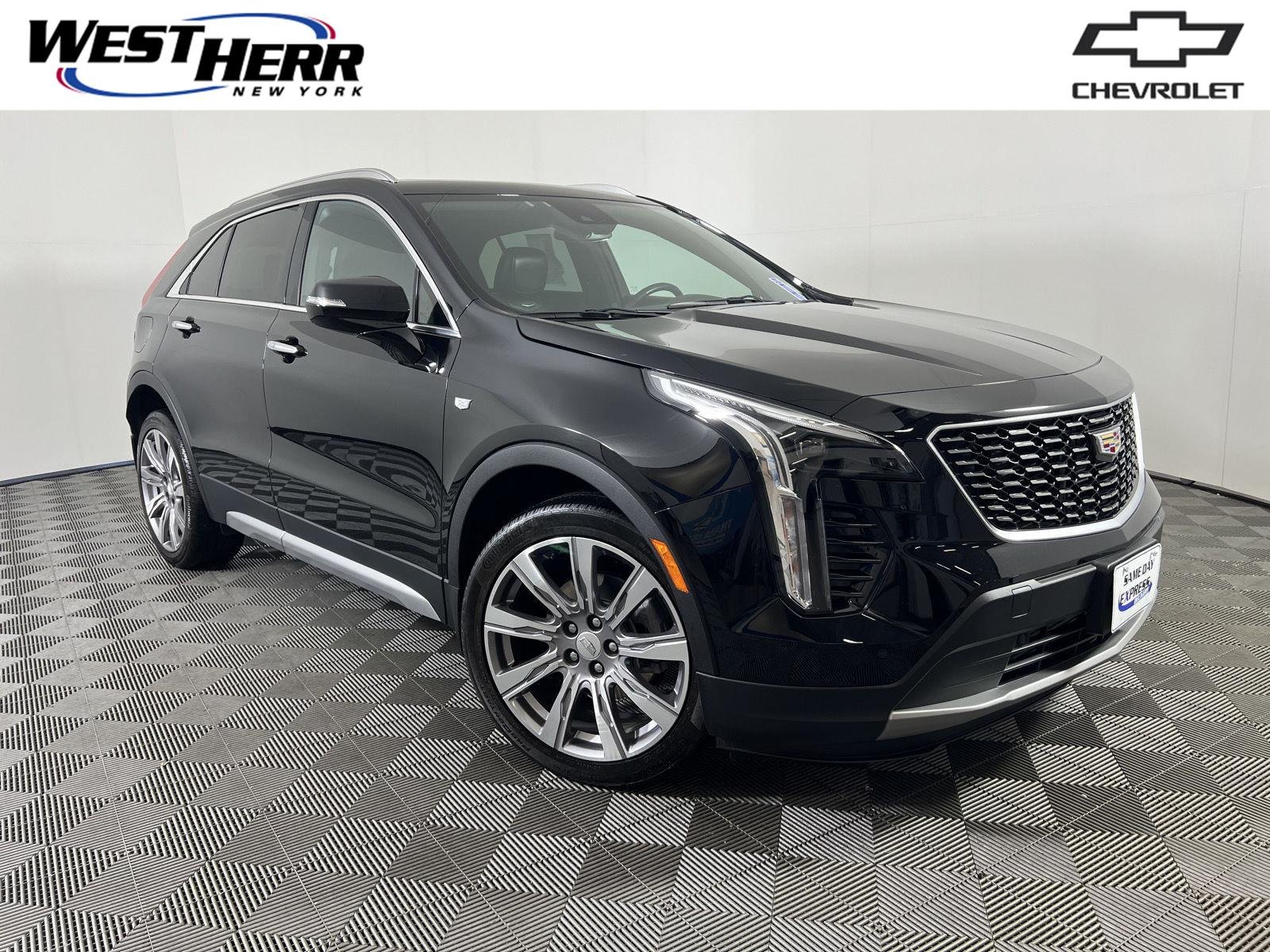 Used 2023 Stellar Black Metallic Cadillac AWD Premium Luxury image 1