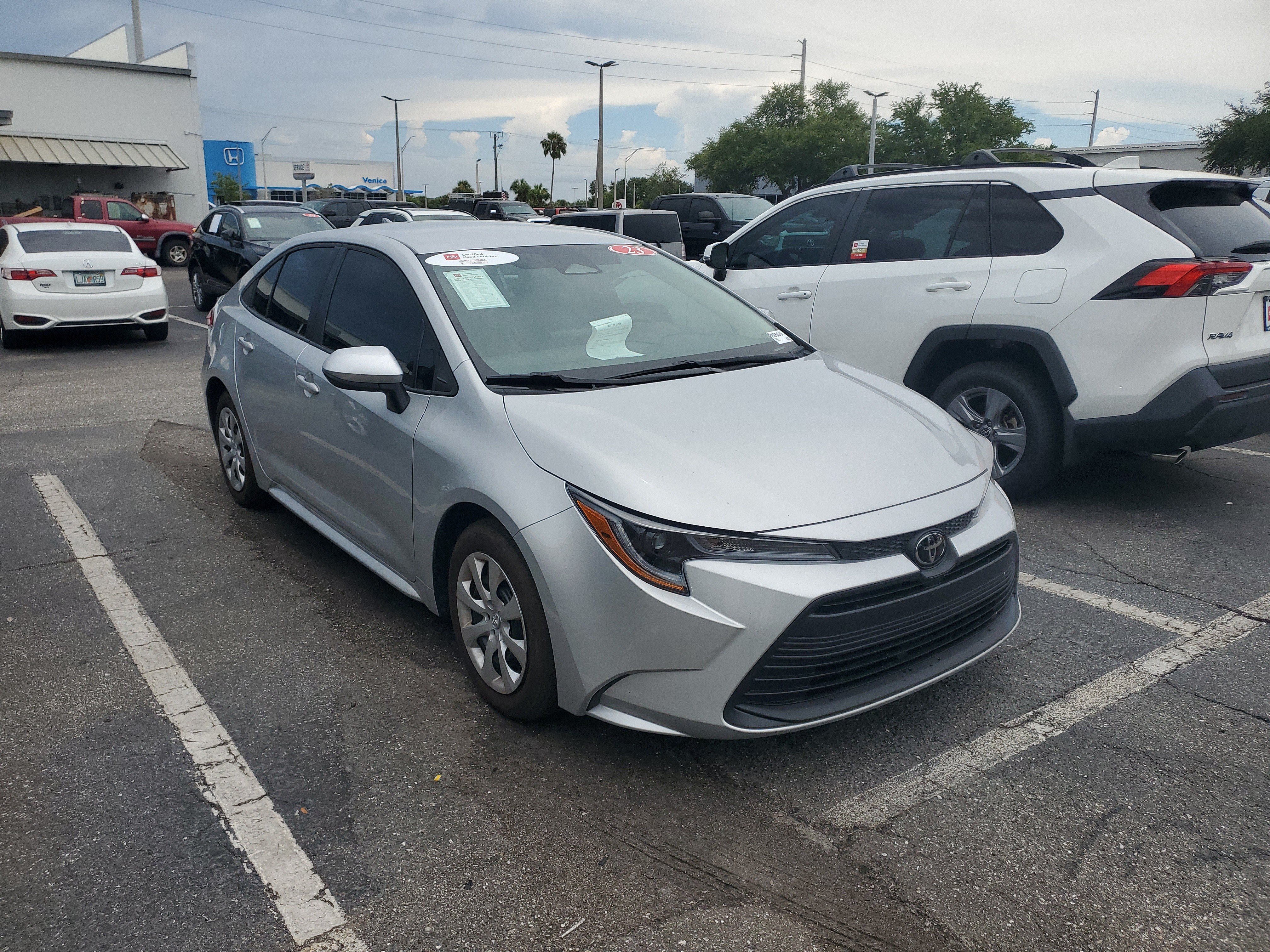 Used 2023 Classic Silver Metallic Toyota LE image 1