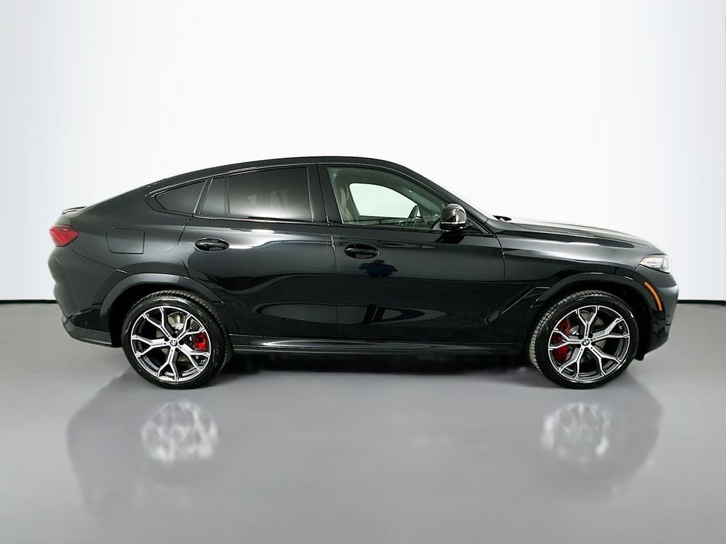New 2027 Black Sapphire Metallic BMW M60i image 4