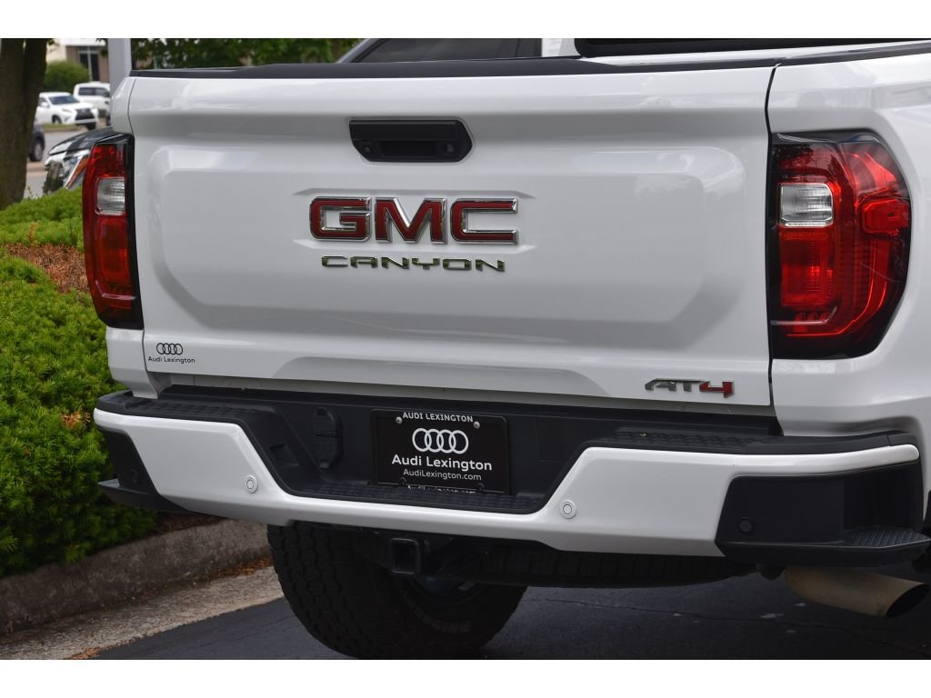 Used 2024 Summit White GMC 4WD AT4 image 23