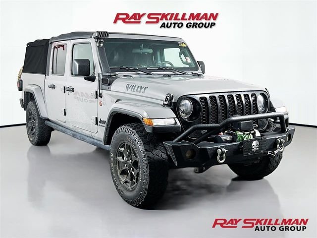 Used 2021 Gray Jeep Sport image 1