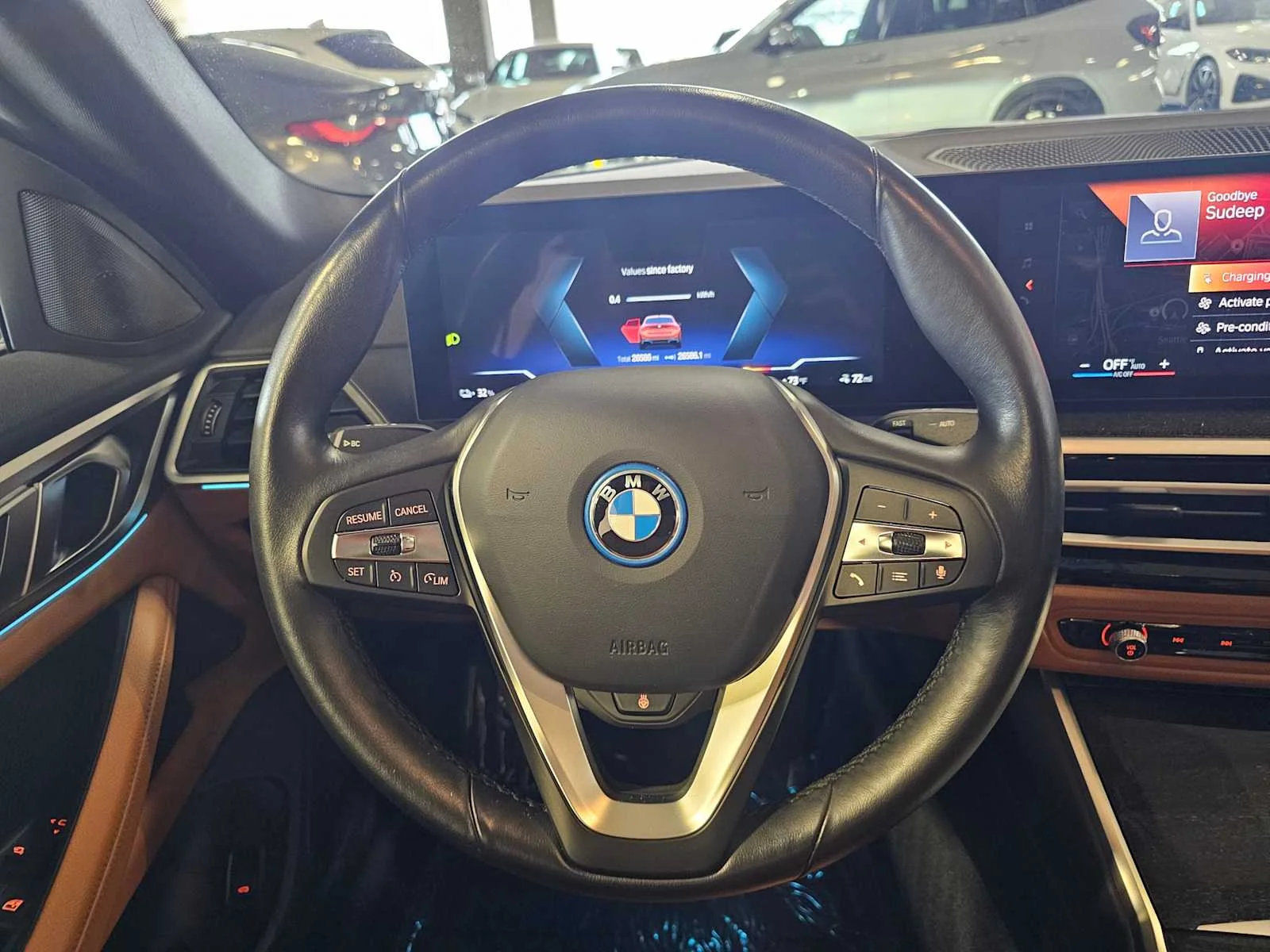 Certified Used 2023 Sunset Orange Metallic BMW eDrive35 image 11