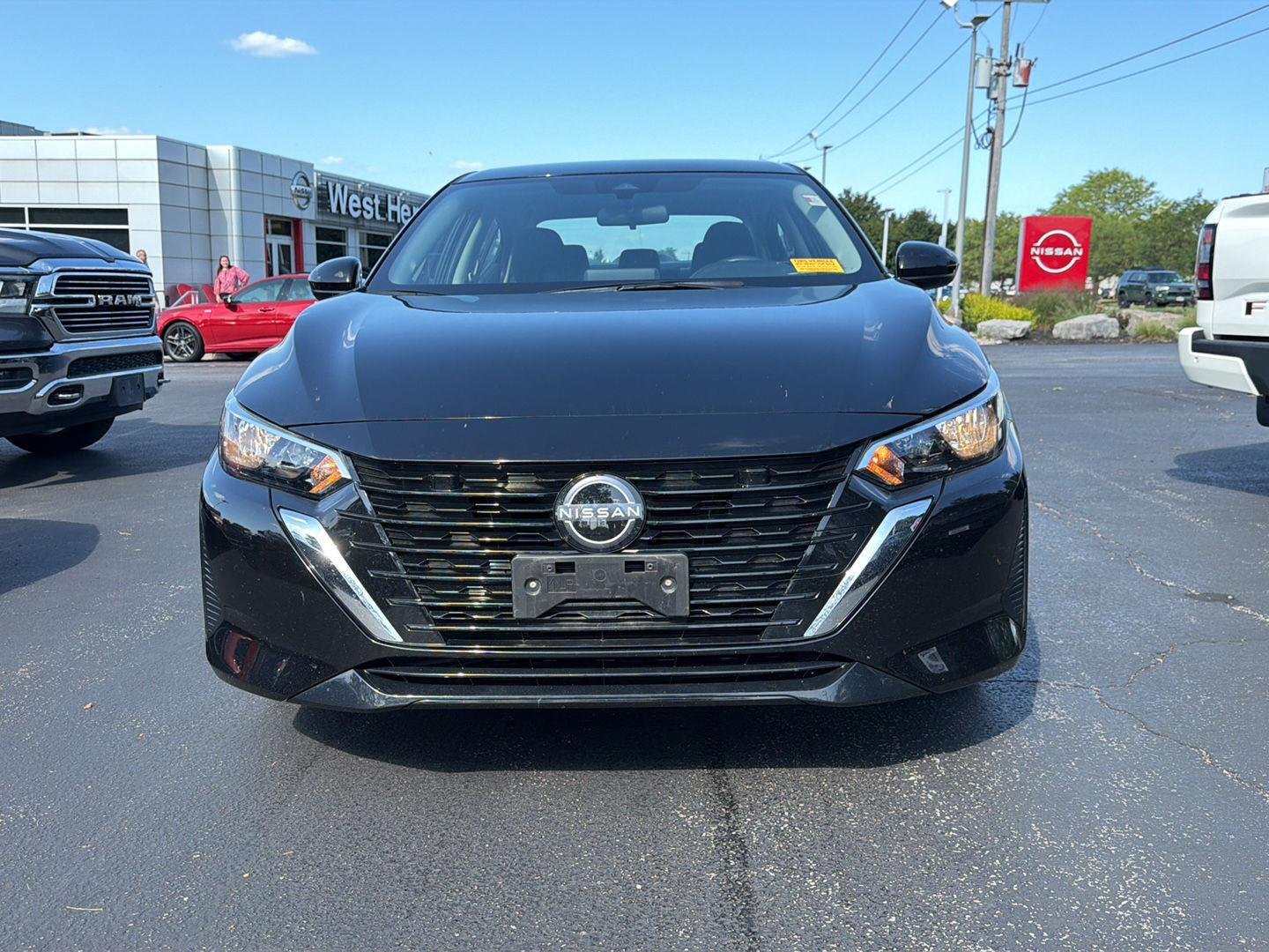 Used 2024 Super Black Nissan SV image 2