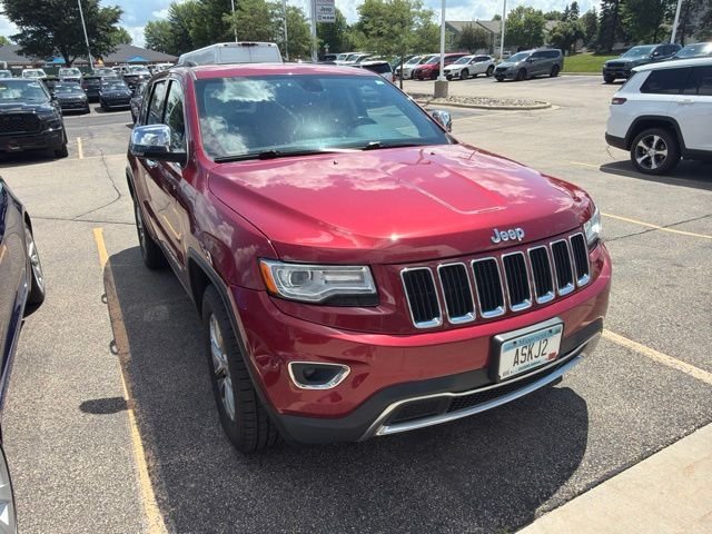 Used 2015 Red Jeep Limited image 1