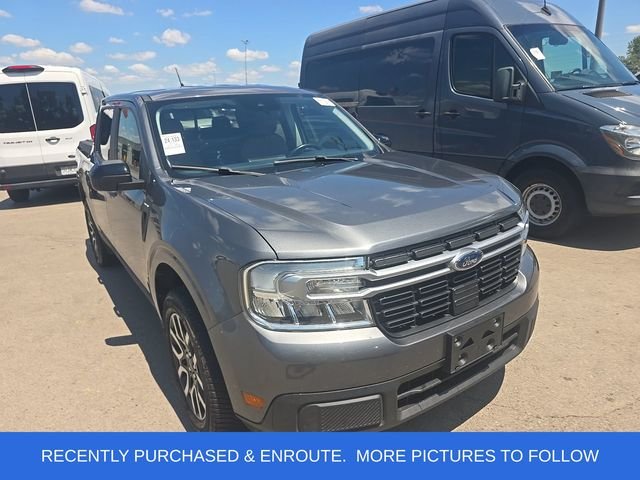 Used 2024 Gray Ford Lariat image 1